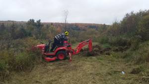 Kneesus on the tractor